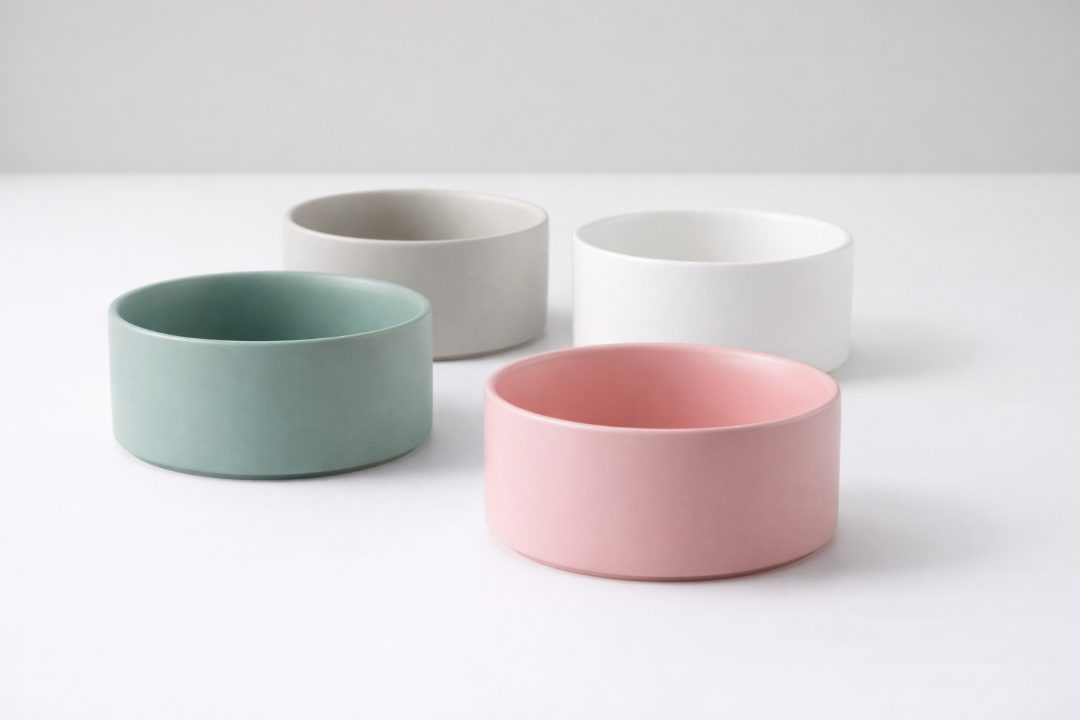 ceramic dog bowls in green grey pink and white with smooth non-porous finish