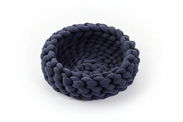 navy blue plush woven cat bed with raised sides for nesting